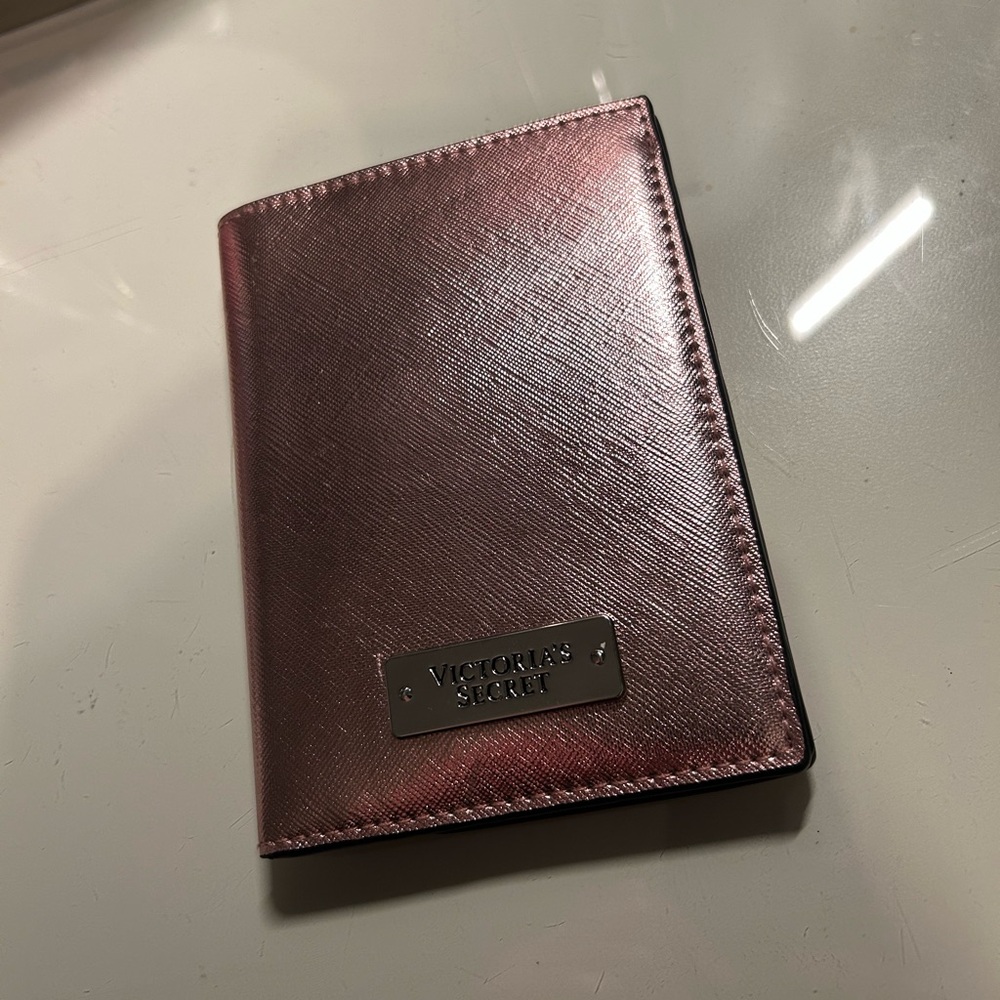 shiny pink victoria’s secret passport holder